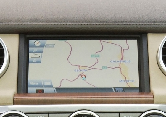 A car touchscreen dashboard displaying a map 