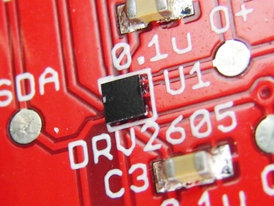 A close up of the Texas Instruments DRV2605