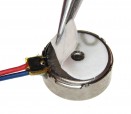 A Self-adhesive pancake vibration motor mounting