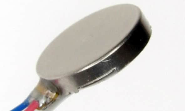 Side view of a coin/pancake vibration motor