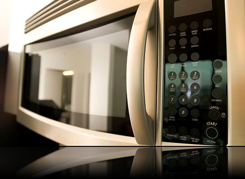 Touchscreen haptic feedback being used in a microwave control panel