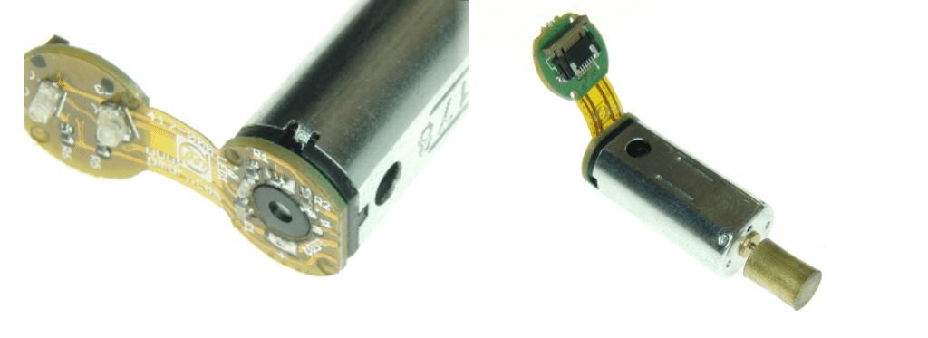 On the left, a close up of a 0.8mm board soldered to the motor terminals via plated through hole slots. On the right is a view from the front of the vibration motor.