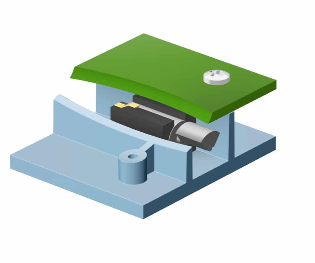 A spring pad vibration motor mounted between an enclosure and a pcb