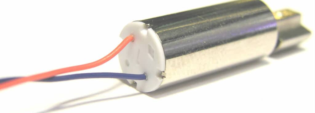 The back of a vibration motor with pre-attached leads