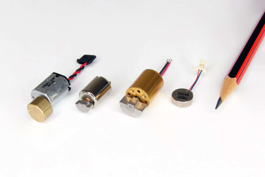 Example eccentric rotating mass (ERM) motors with varying construction technologies.