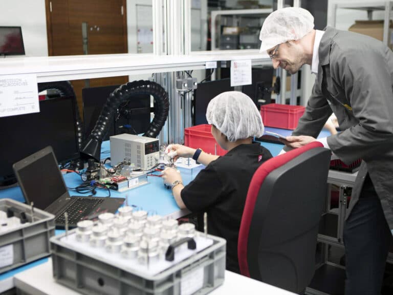 Precision Microdrives employees in our Hong Kong facility