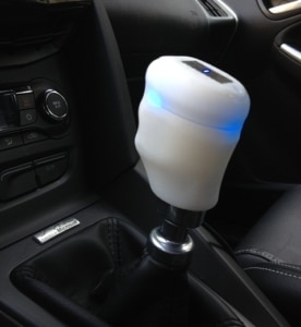 Close up of the haptic gear stick installed in a car 